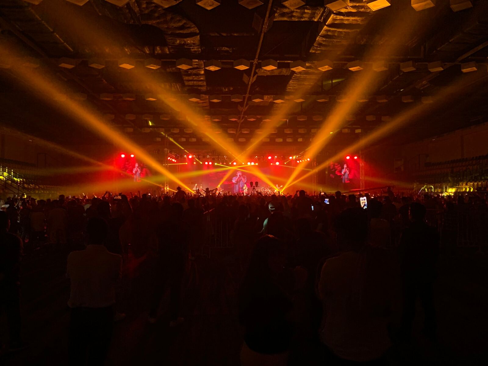 Live concert with light beams produced by Gramy Events